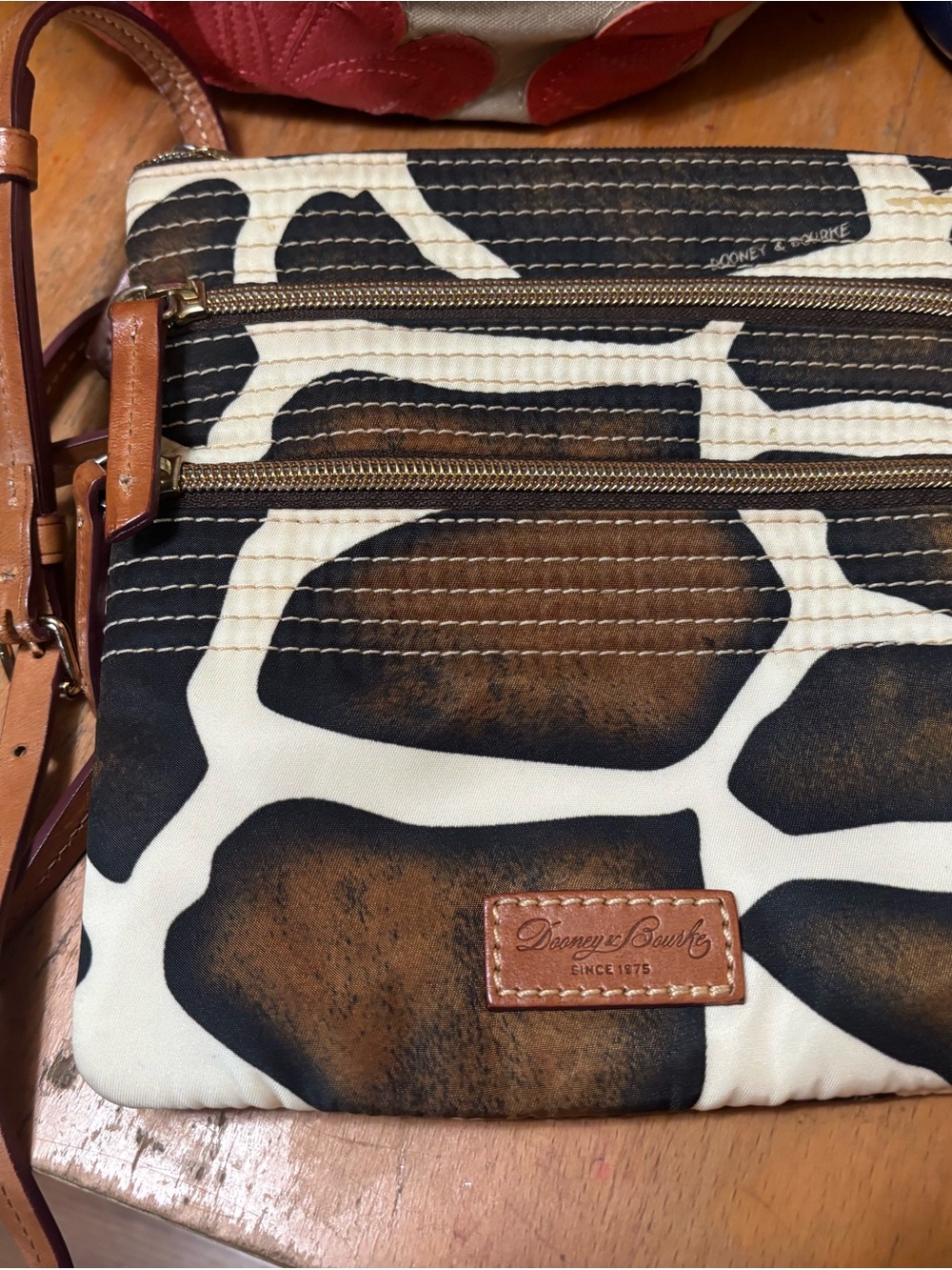 Dooney & Bourke Brown, Black & Cream Giraffe-Pattern Messenger Bag